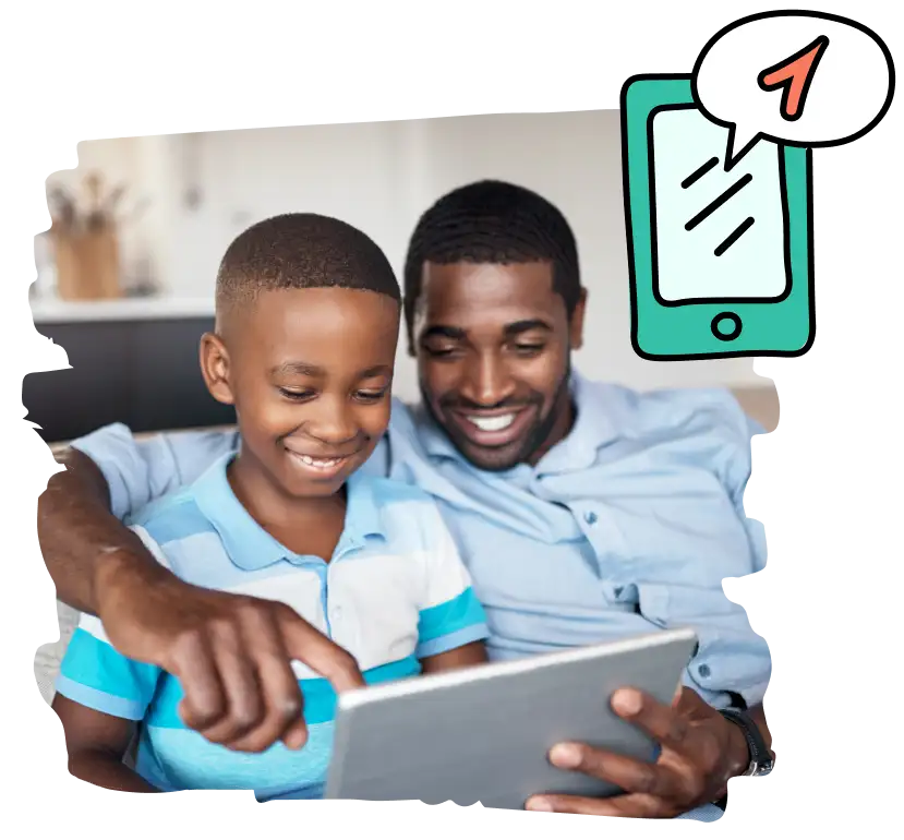 A father demonstrates behaviors for safe online activity to his son.